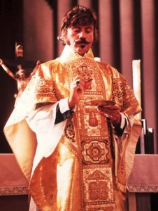 Oliver Reed as Father Grandier